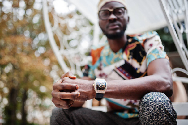 Close up royal watches on hand of rich african american man. - Fotó, kép