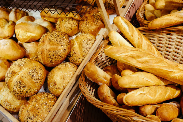 kenyér élelmiszer háttér barna búza graine roll Lot péksütemények tétel termék sült baguette - Fotó, kép