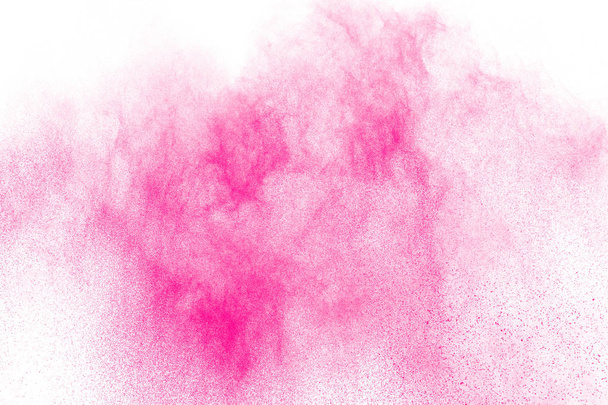 Beyaz arka planda pembe toz patlaması. Pembe toz sıçrama bulutu - Fotoğraf, Görsel