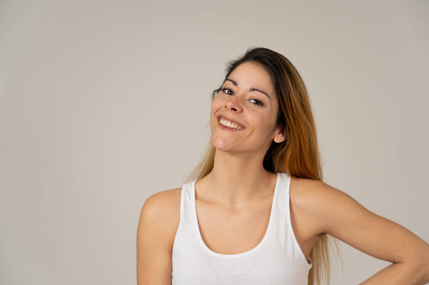 Portrait of attractive young caucasian woman with happy face and beautiful smile having fun. Isolated on neutral background In People, positive human facial expressions and emotions concept. - Foto, Bild