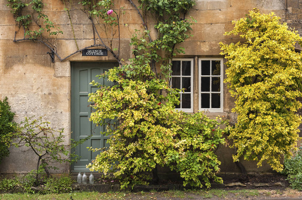 STANTON, ENGLAND - MAY, 26 2018: Stanton is a village in the Cotswolds district of Gloucestershire and is built almost completely of Cotswold stone, a honey-coloured Jurassic limestone   - Photo, image