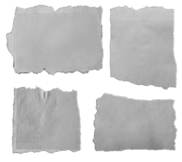 Trozos de papel rasgados
 - Foto, imagen