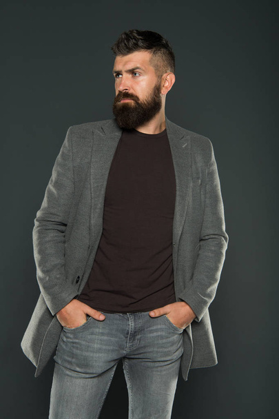 Fashion outfit. Masculine look. Brutal hipster man. Hipster wearing casual clothes. Hipster beard and stylish haircut. Bearded man trendy hipster style. Monochrome style outfit. Classy but modern - Foto, Imagen