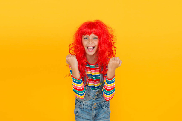 I am ginger and proud of it. Redhead stereotypes. Redheads are not some creatures with magical soul sucking powers. Crazy redhead wig. Messy hairstyle. Kid cheerful smiling happy redhead girl - Φωτογραφία, εικόνα