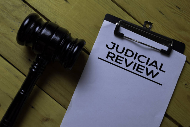 Judicial Review Document form and Black Judges gavel on wooden desk. Law concept - Foto, Bild