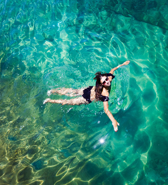Aerial view of a woman in the sea  - Foto, Imagen