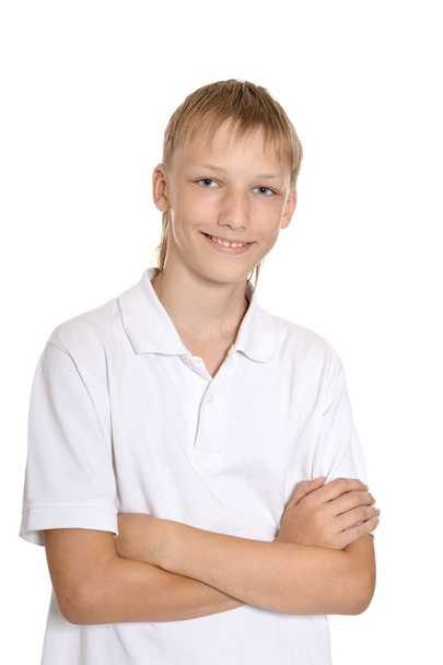 Smiling teenage boy on white background - Foto, imagen