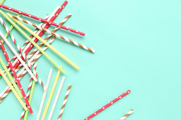 Colorful paper straws on blue background - Photo, image