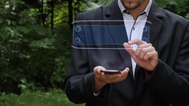 Homme d'affaires utilise l'hologramme avec le texte Acheter une maison
 - Séquence, vidéo