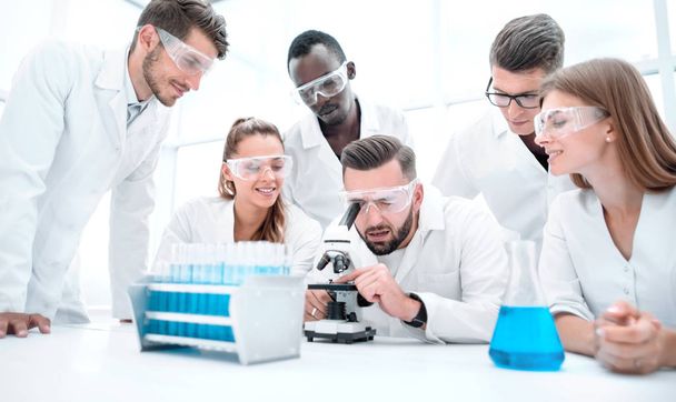 Chemistry experiment - scientists in laboratory testing vaccination - Fotó, kép