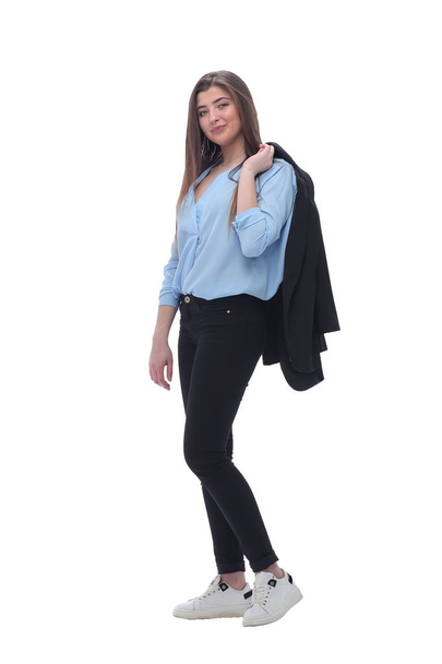 young business woman with a jacket over her shoulder .isolated on white - Φωτογραφία, εικόνα