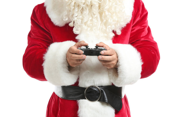 Santa Claus playing video game on white background, closeup - Foto, Imagem
