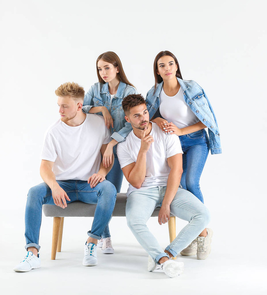 Group of young people in stylish casual clothes on white background - Fotografie, Obrázek