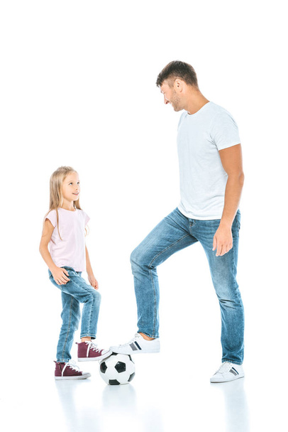 happy father playing football with daughter on white  - Foto, imagen
