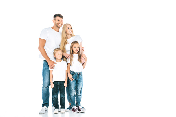 família feliz em jeans azul em pé no branco
  - Foto, Imagem