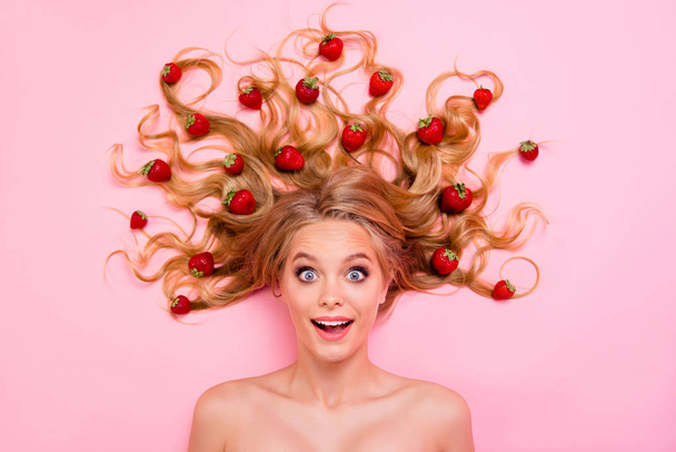 Close up top above high angle view photo beautiful wondered she her lady lying down among fruits strawberries long hair yummy tasty useful full vitamins complex salon isolated pink background - Φωτογραφία, εικόνα