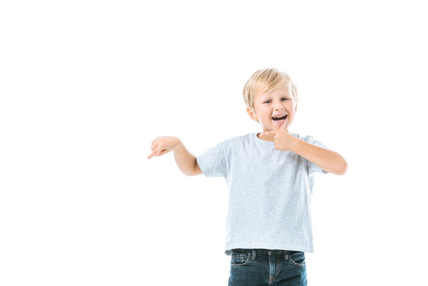 excited boy pointing with finger isolated on white  - Foto, Imagem