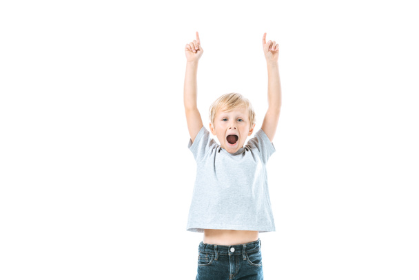 excited kid with opened mouth pointing with fingers isolated on white  - Fotoğraf, Görsel