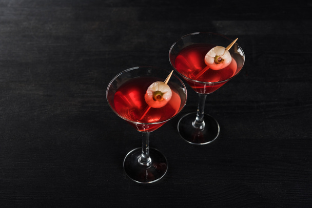 red decorated Halloween cocktails on black background - Фото, зображення
