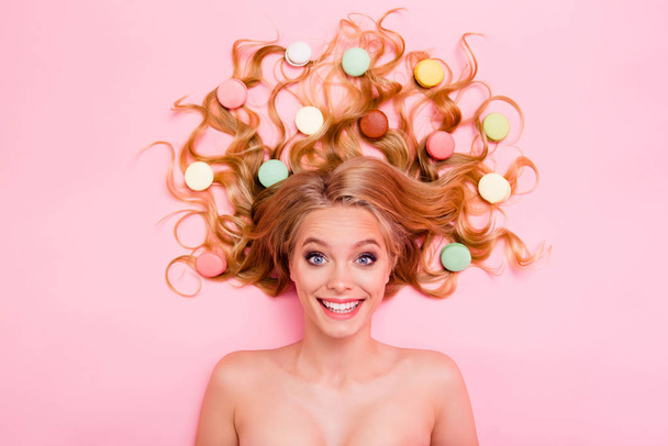 Close up top above high angle photo beautiful she her lady energetic amazed lying down sweets perfect ideal hair slim skinny stunning curious interested naked isolated rose pink background - Photo, image