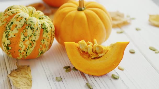 Yellow pumpkins laid on table - Footage, Video