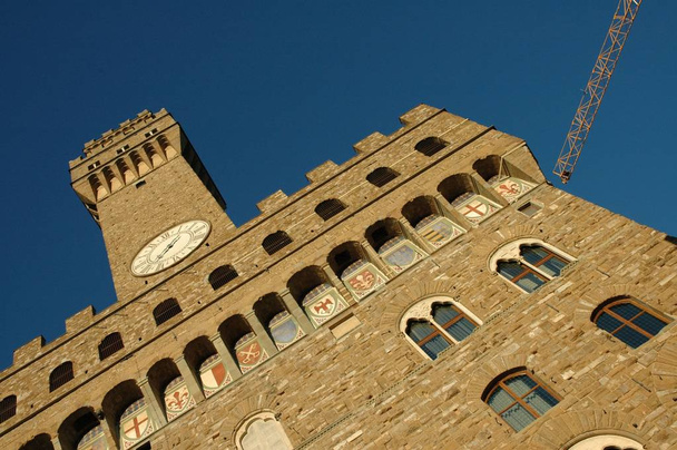 A low angle shot of Piazza della Signoria with the background of the blue sky - Фото, зображення