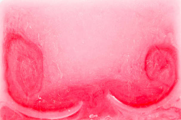 Close-up, shallow focus of a bar of natural soap with engraved letters on its side. - Photo, Image