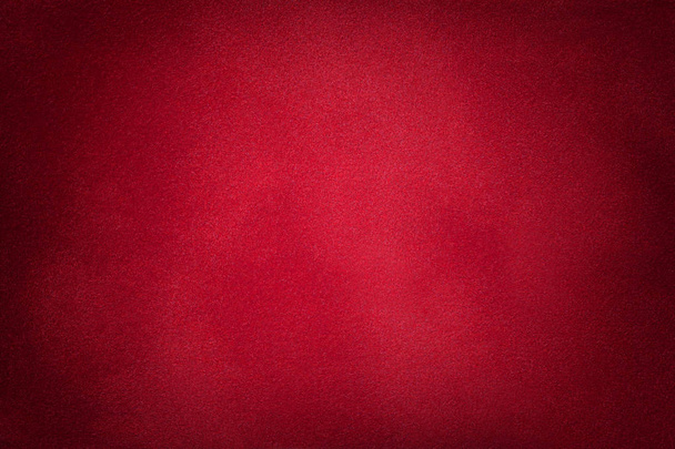 Темно-червоний матовий фон замшевої тканини, крупним планом
. - Фото, зображення