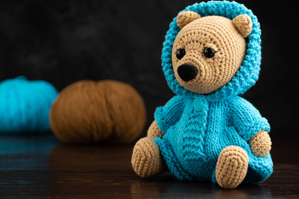 Funny knitted toy bear. Amigurumi toy. Crochet stuffed animals. - Photo, Image