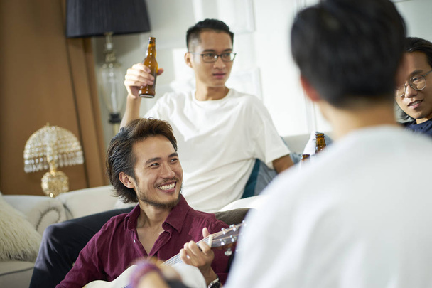 young asian adults partying at home - Fotoğraf, Görsel