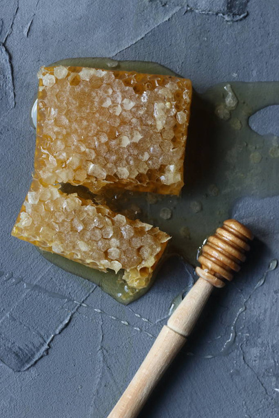 Honeycomb on a grey background - Foto, Imagen