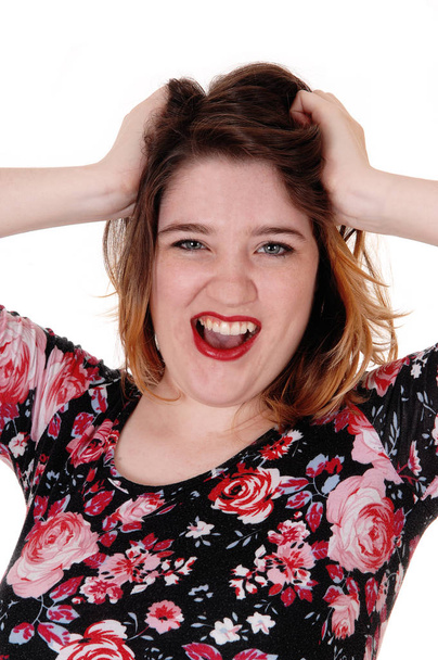 Screaming woman with hands in the hair - Photo, Image