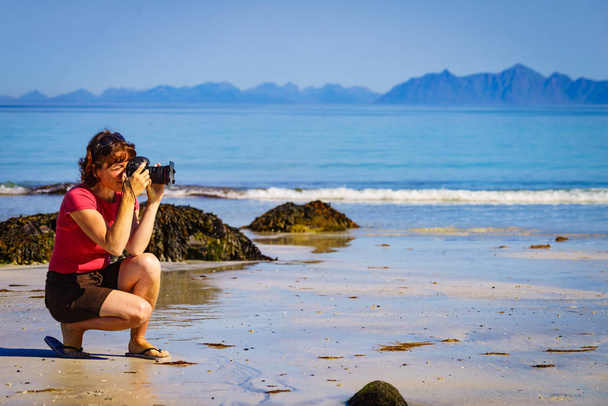 Woman take photo on beach, Lofoten Norway - Fotografie, Obrázek