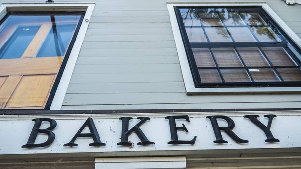 Nápis-pekařství na staré dřevěné budově v americkém vnitrozemí - Fotografie, Obrázek