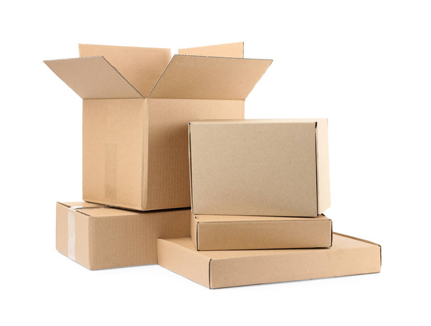 Pile of cardboard boxes on white background - Φωτογραφία, εικόνα
