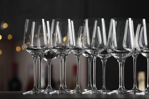 Empty clean glasses on counter in bar - Photo, image