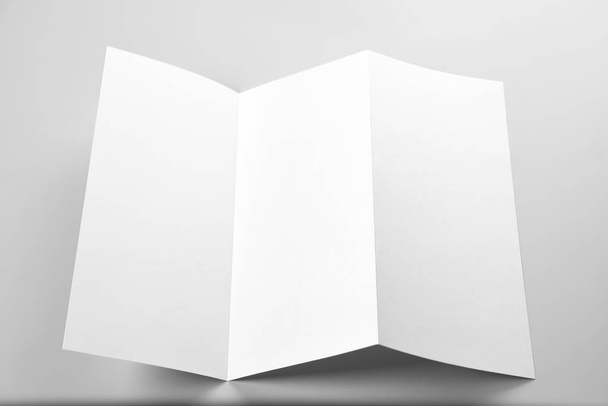 Blank Open Flyer, Folded Letterhead, or Letter Over Grey Background - Fotoğraf, Görsel