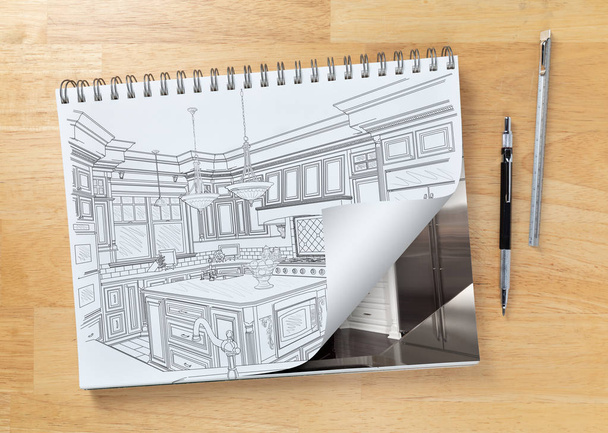 Sketch Pad on Desk with Drawing of Custom Kitchen and Page Corner Turning to Show Finished Construction Next to Engineering Pencil and Ruler Scale
. - Фото, изображение