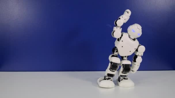 Robot is dancing on table in experimental lab - Footage, Video