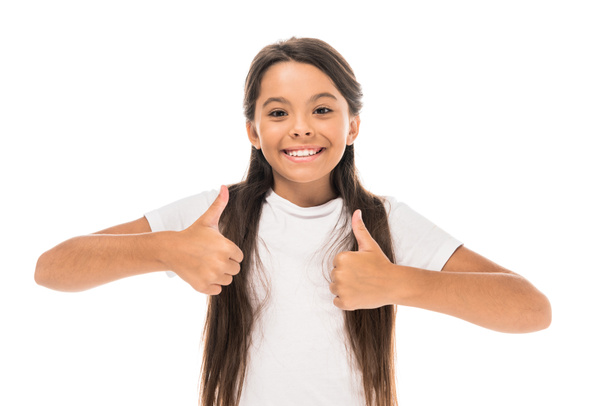 happy kid showing thumbs up isolated on white - Fotó, kép