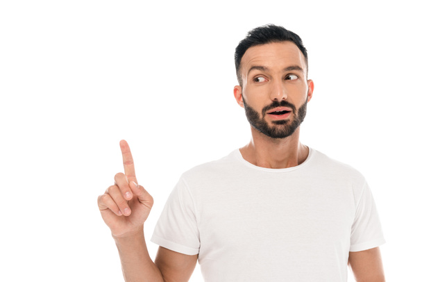 surprised bearded man pointing with finger isolated on white  - Φωτογραφία, εικόνα