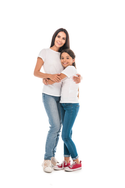 happy mother and daughter hugging isolated on white - Fotografie, Obrázek