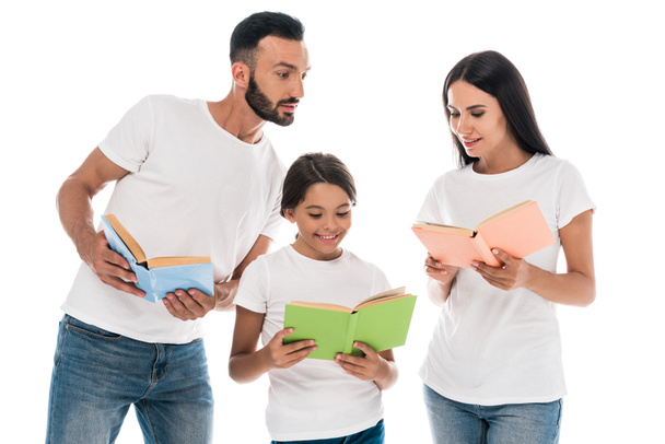 happy family holding books isolated on white  - Фото, изображение