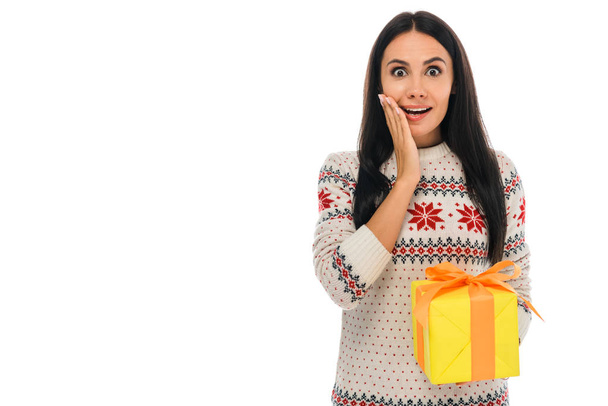 excited woman holding yellow present isolated on white  - Photo, image