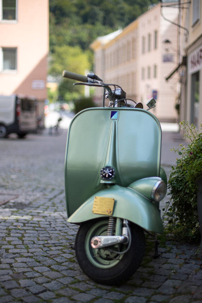vintage scooter on the street background - 写真・画像