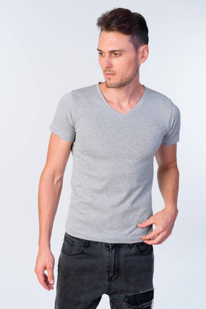 Studio shot of handsome man with casual clothing - Foto, Bild