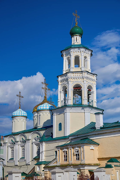 The bell tower of the old Orthodox Christian Cathedral in Kazan. Religion, faith in God. Tourism and travel, viewing of historical sights. - Photo, Image
