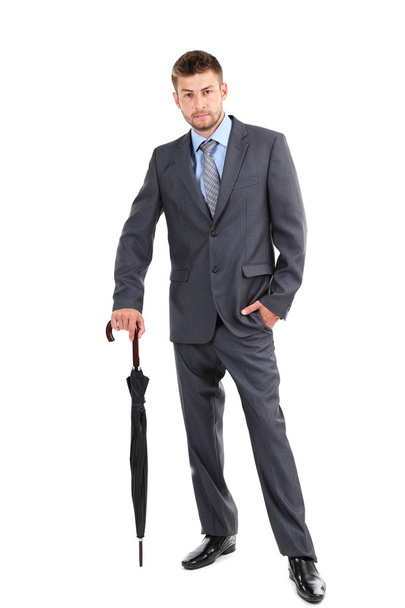 Businessman with umbrella, isolated on white - Фото, изображение