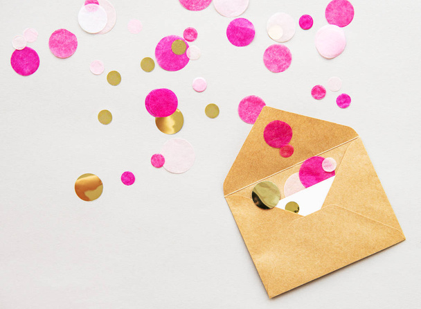 Envelope, blank card and confetti - 写真・画像