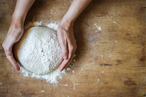 dough raw, flour, rolling pin for rolling (preparation for cooking) menu concept. food background. copy space - Photo, image